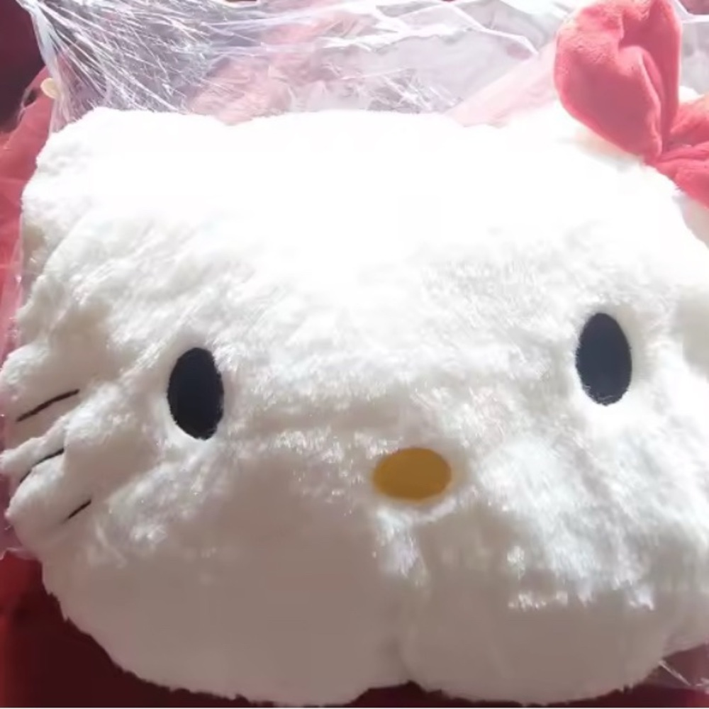 Adorable Plush Cushion with Red Bow